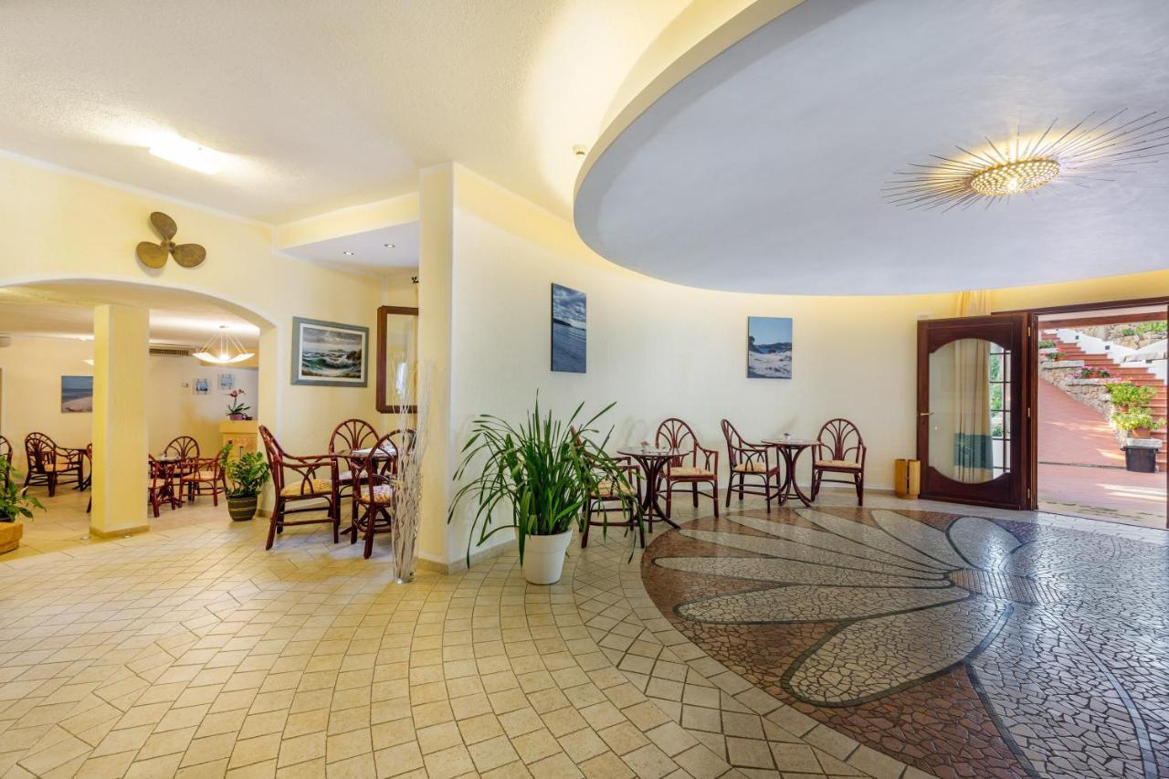 Hotel Mon Repos Baja Sardinia Exterior photo
